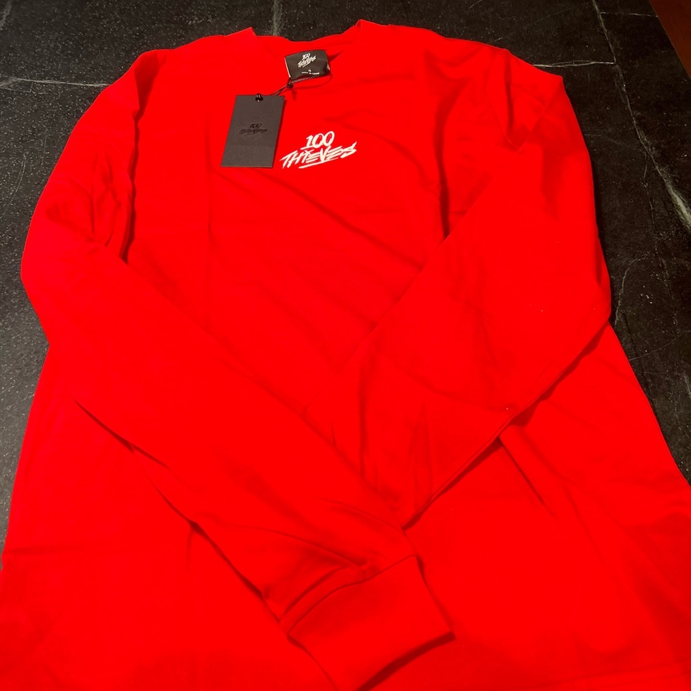 100 Thieves Mens Shirt. Brand new in the package.